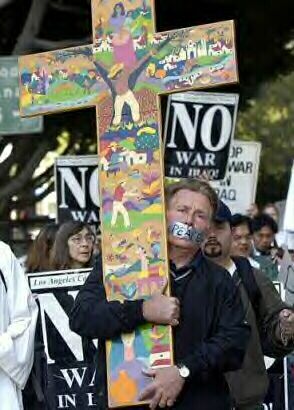 Martin Sheen with cross, Los Angeles, Wednesday, March 26, 2003.